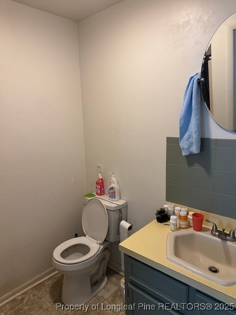 997 Balfour Road Red Springs, NC 28377 - Photo 10 of 20 a bathroom with a sink and a toilet