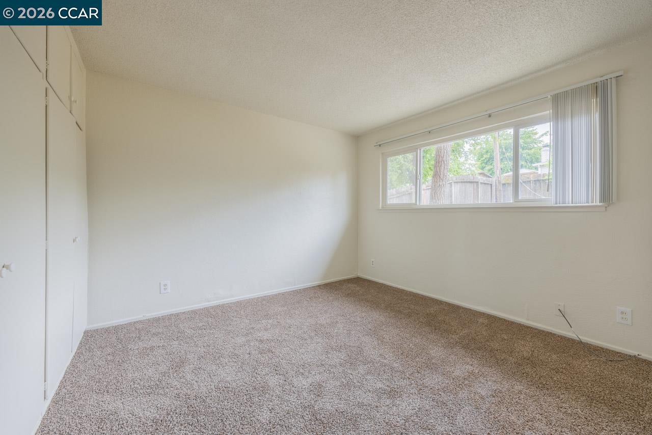 6118 Rutland Drive Carmichael, CA 95608 - Photo 13 of 19 an empty room with windows