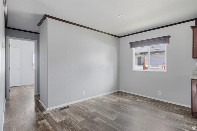 433 North 750 West Logan, UT 84321 - Photo 11 of 40 Interior space featuring wood-finish flooring and light gray walls