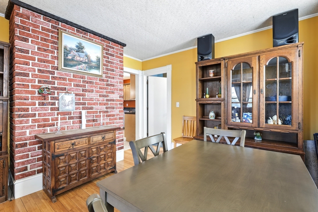 1014 Hampden Street Holyoke, MA 01040 - Photo 16 of 36 a view of a balcony with table and chairs