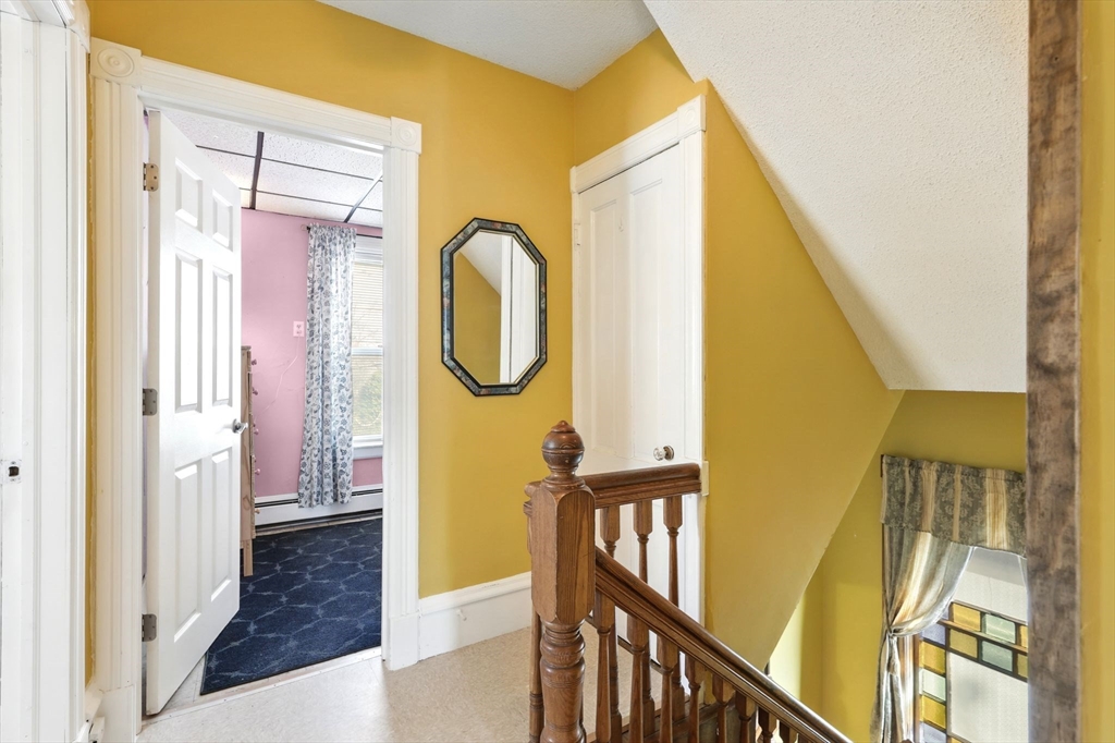 1014 Hampden Street Holyoke, MA 01040 - Photo 20 of 36 a view of a bathroom from a hallway