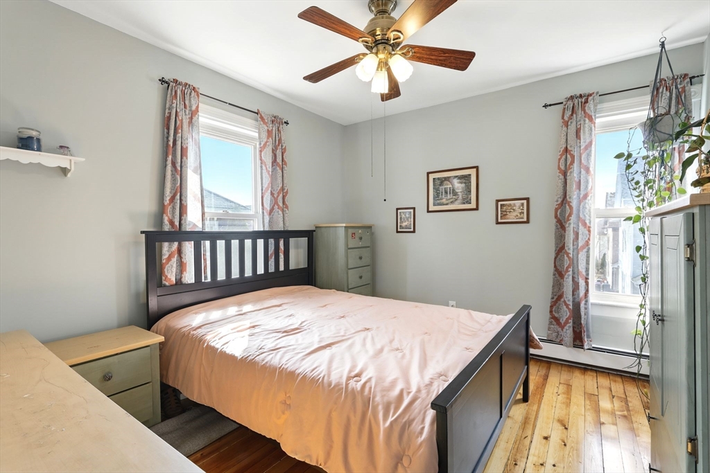 1014 Hampden Street Holyoke, MA 01040 - Photo 21 of 36 a bedroom with a bed and a window