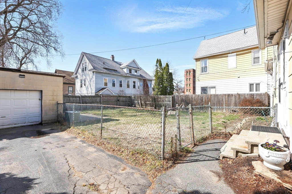 1014 Hampden Street Holyoke, MA 01040 - Photo 26 of 36 a view of a house with a backyard patio and swimming pool