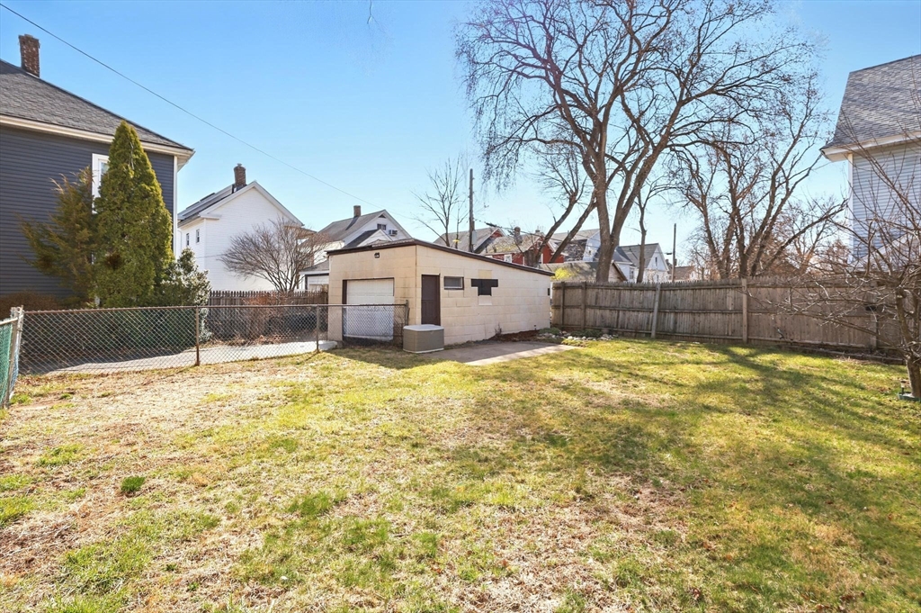1014 Hampden Street Holyoke, MA 01040 - Photo 27 of 36 a front view of a house with a yard