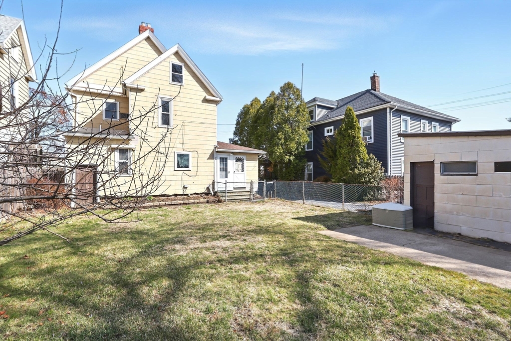 1014 Hampden Street Holyoke, MA 01040 - Photo 29 of 36 a view of a house with a yard and garage