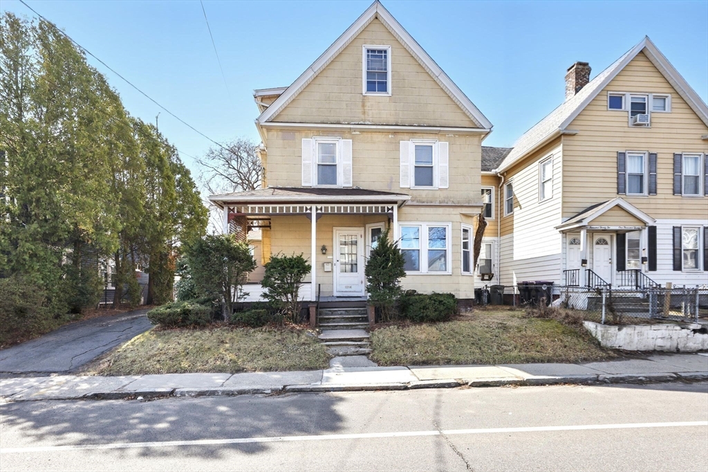 1014 Hampden Street Holyoke, MA 01040 - Photo 32 of 36 a front view of a house with a yard