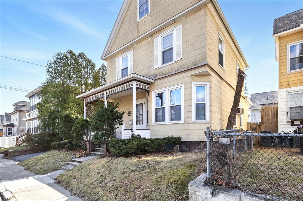 1014 Hampden Street Holyoke, MA 01040 - Photo 34 of 36 a front view of a house with garden