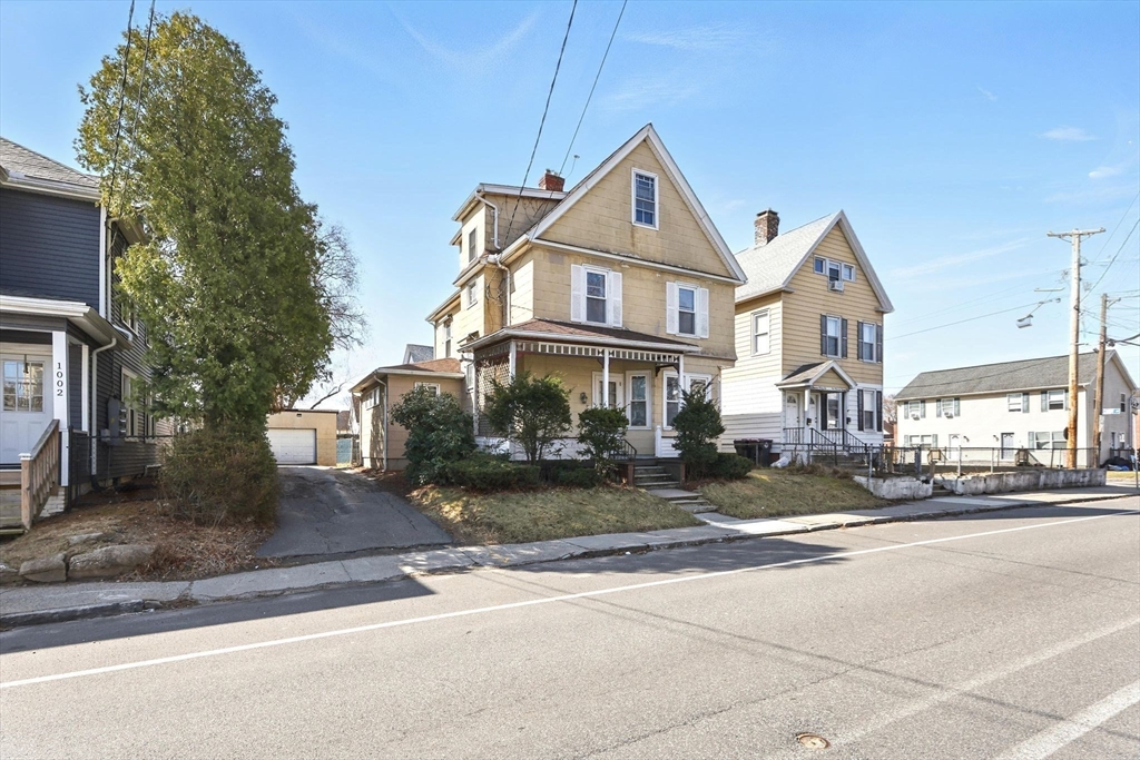 1014 Hampden Street Holyoke, MA 01040 - Photo 36 of 36 a front view of a house with a yard