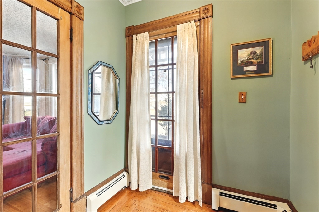 1014 Hampden Street Holyoke, MA 01040 - Photo 8 of 36 a view of a bathroom with a sink and a window