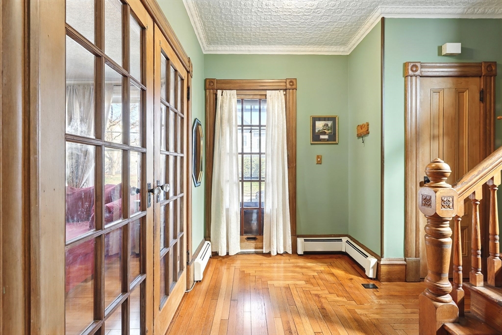 1014 Hampden Street Holyoke, MA 01040 - Photo 9 of 36 a view of a room with large windows and furniture