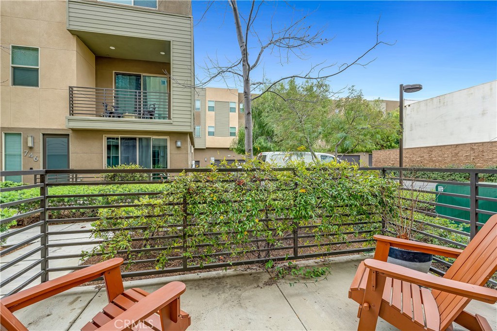 755 Sawyer Place Upland, CA 91786 - Photo 12 of 57 a front view of a house with a garden
