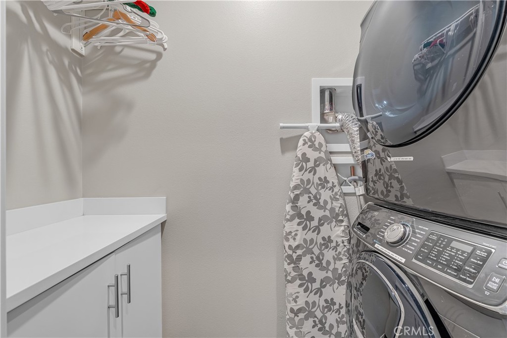 755 Sawyer Place Upland, CA 91786 - Photo 42 of 57 a utility room with dryer and washer