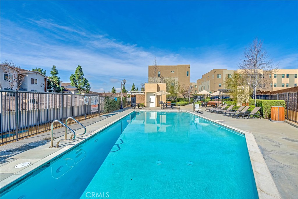755 Sawyer Place Upland, CA 91786 - Photo 55 of 57 a view of a swimming pool with a lounge chair