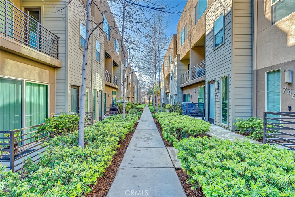 755 Sawyer Place Upland, CA 91786 - Photo 6 of 57 a view of a pathway along a brick building