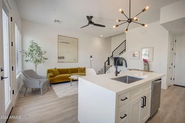 a living room with furniture and a couch