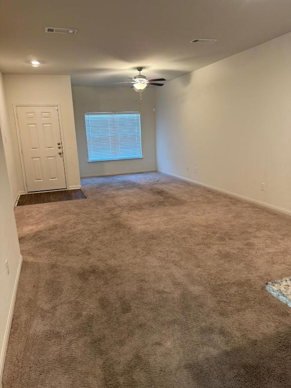 14325 Boomtown Way Elgin, TX 78621 - Photo 26 of 29 a view of an empty room