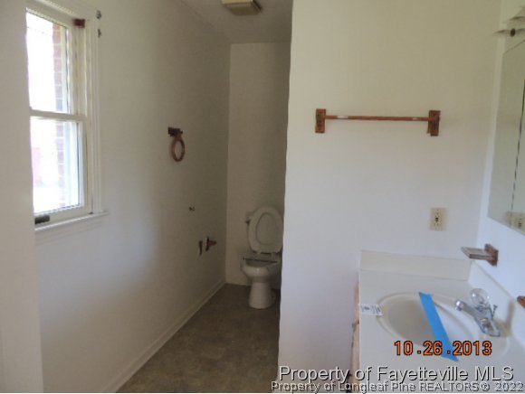 3020 Underwood Road Carthage, NC 28327 - Photo 12 of 14 a bathroom with a toilet and a shower