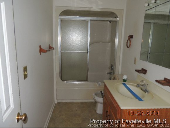 3020 Underwood Road Carthage, NC 28327 - Photo 13 of 14 a bathroom with a sink a toilet and shower