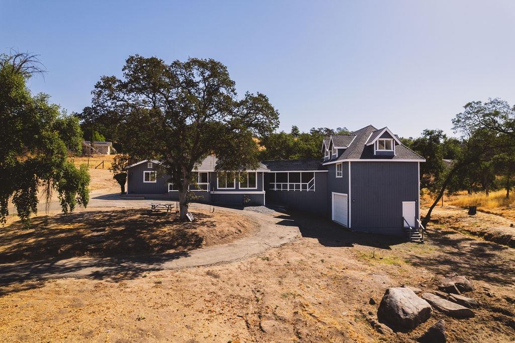 a view of a wooden fence next to a road
