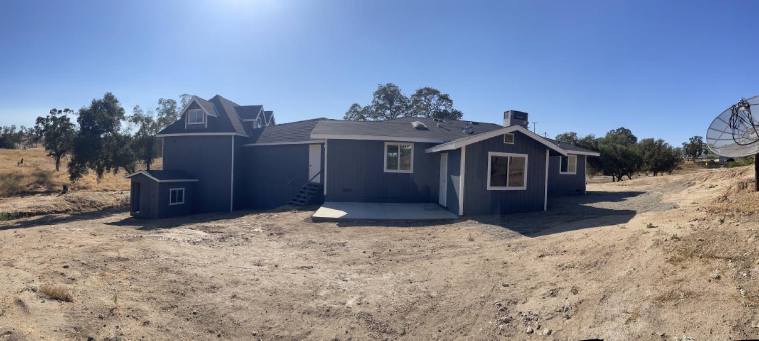 28369 Road 400 Madera, CA 93636 - Photo 31 of 33 a view of a house with a yard