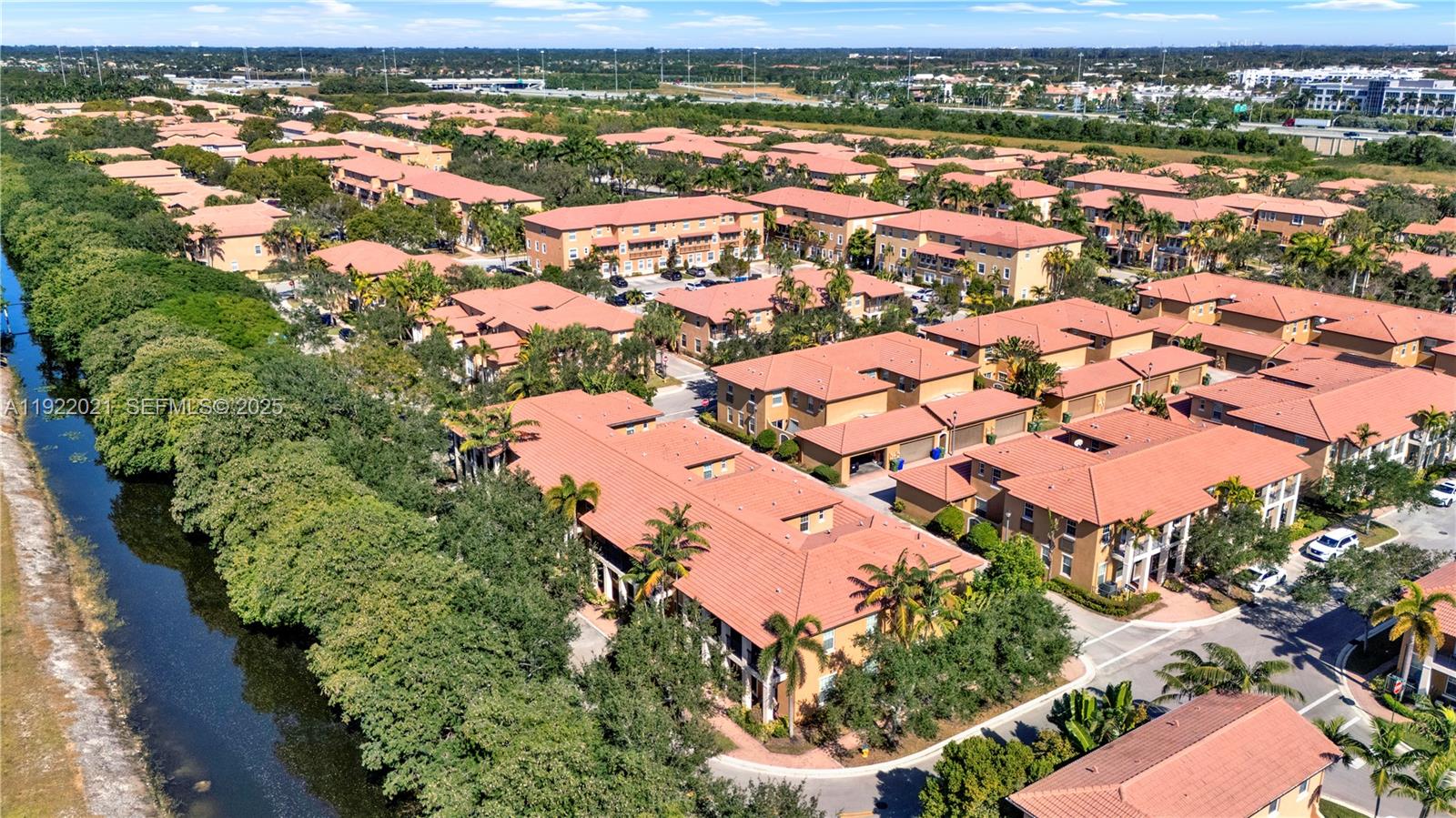 1121 Southwest 147th Terrace Pembroke Pines, FL 33027 - Photo 30 of 32 an aerial view of residential houses with outdoor space