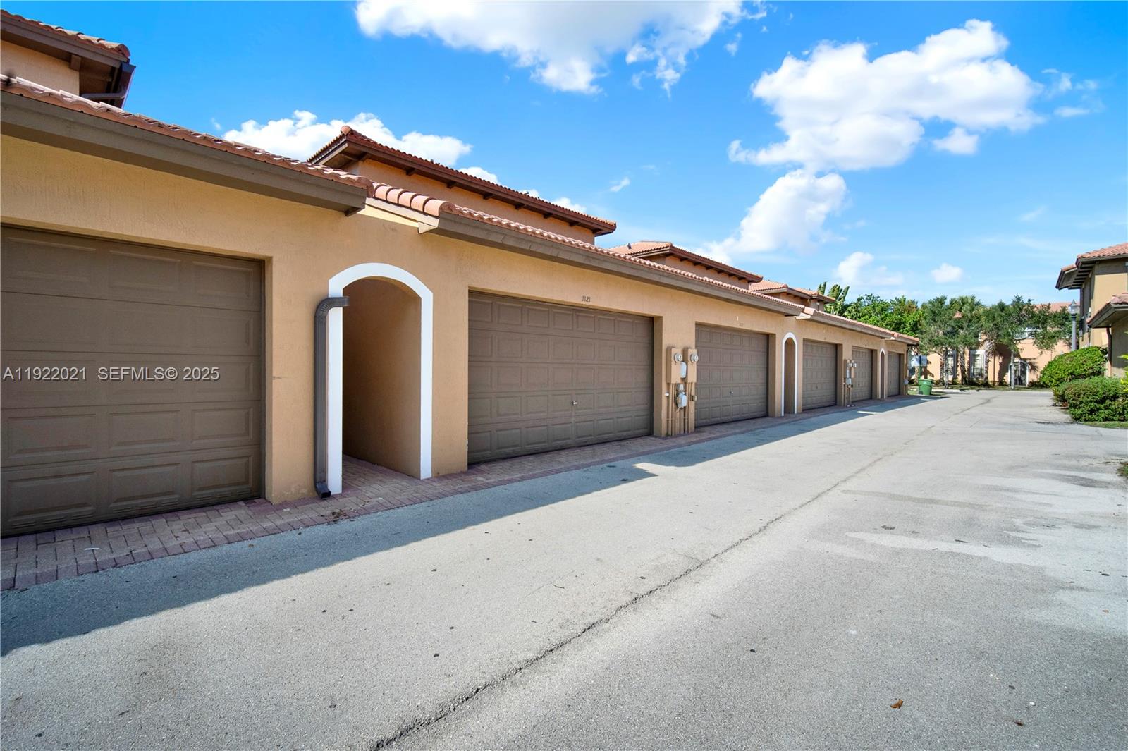 1121 Southwest 147th Terrace Pembroke Pines, FL 33027 - Photo 3 of 32 a front view of a house with a garage