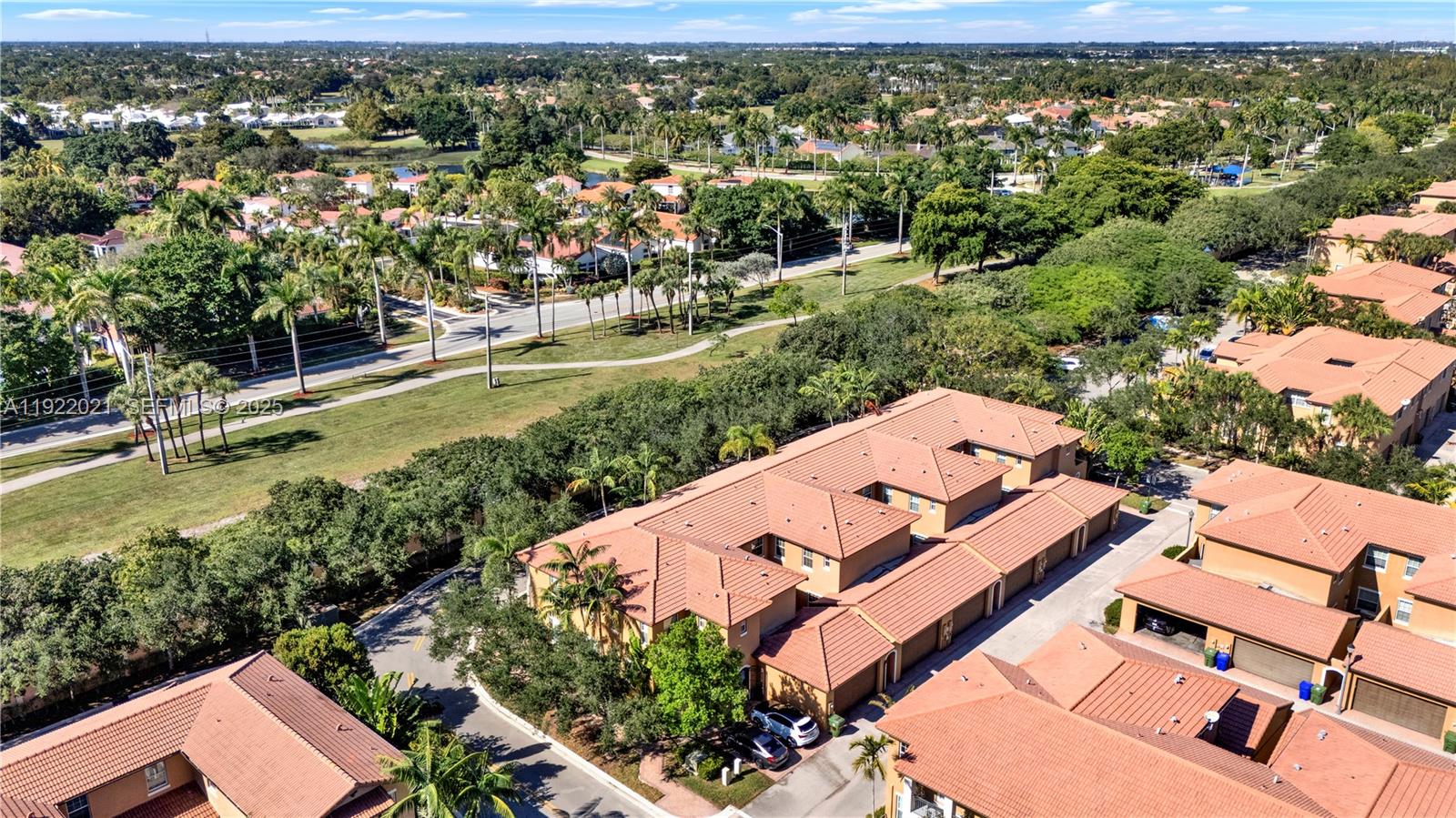 1121 Southwest 147th Terrace Pembroke Pines, FL 33027 - Photo 31 of 32 an aerial view of residential houses with outdoor space