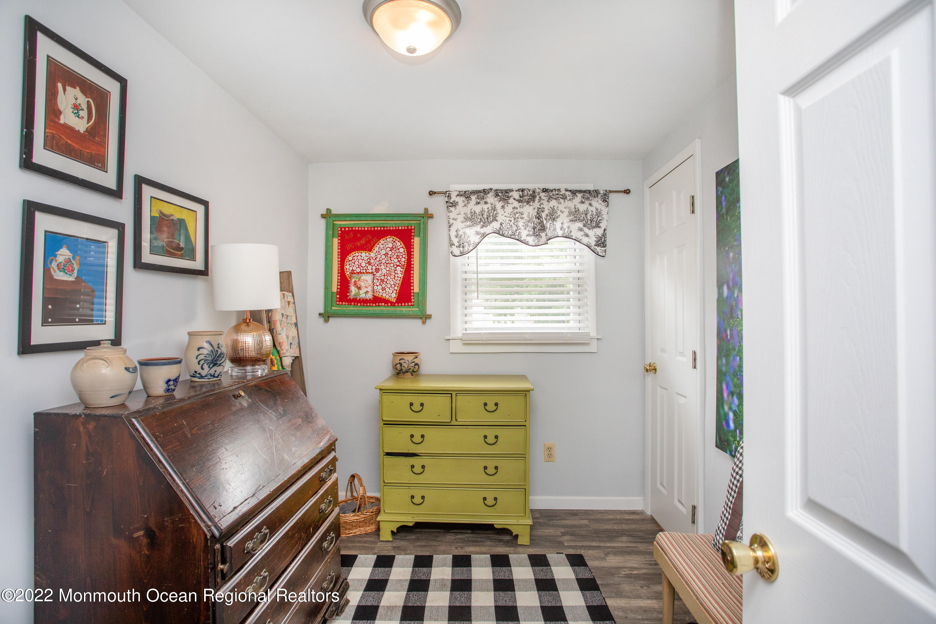 111 Manito Road Manasquan, NJ 08736 - Photo 25 of 37 a room with furniture and a window