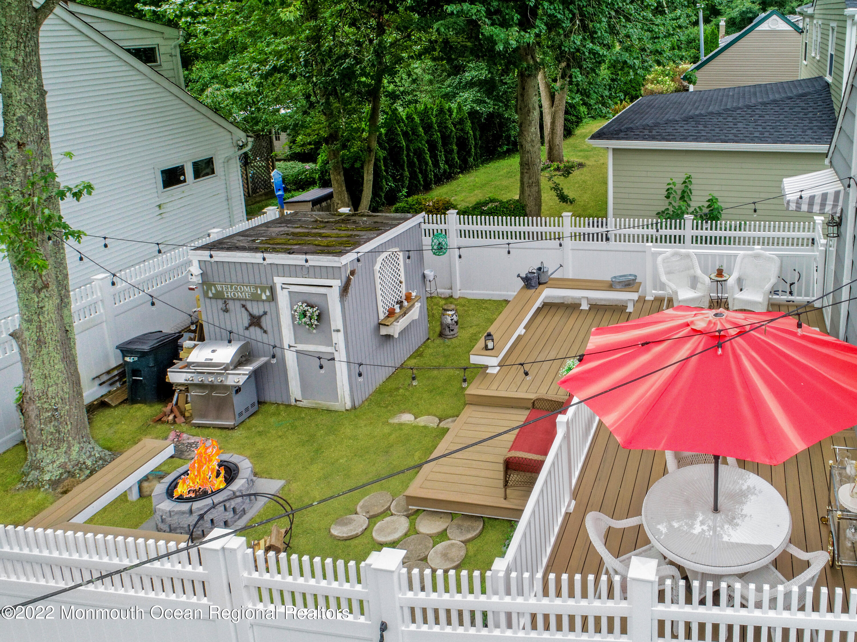 111 Manito Road Manasquan, NJ 08736 - Photo 28 of 37 a front view of house with yard swimming pool and furniture