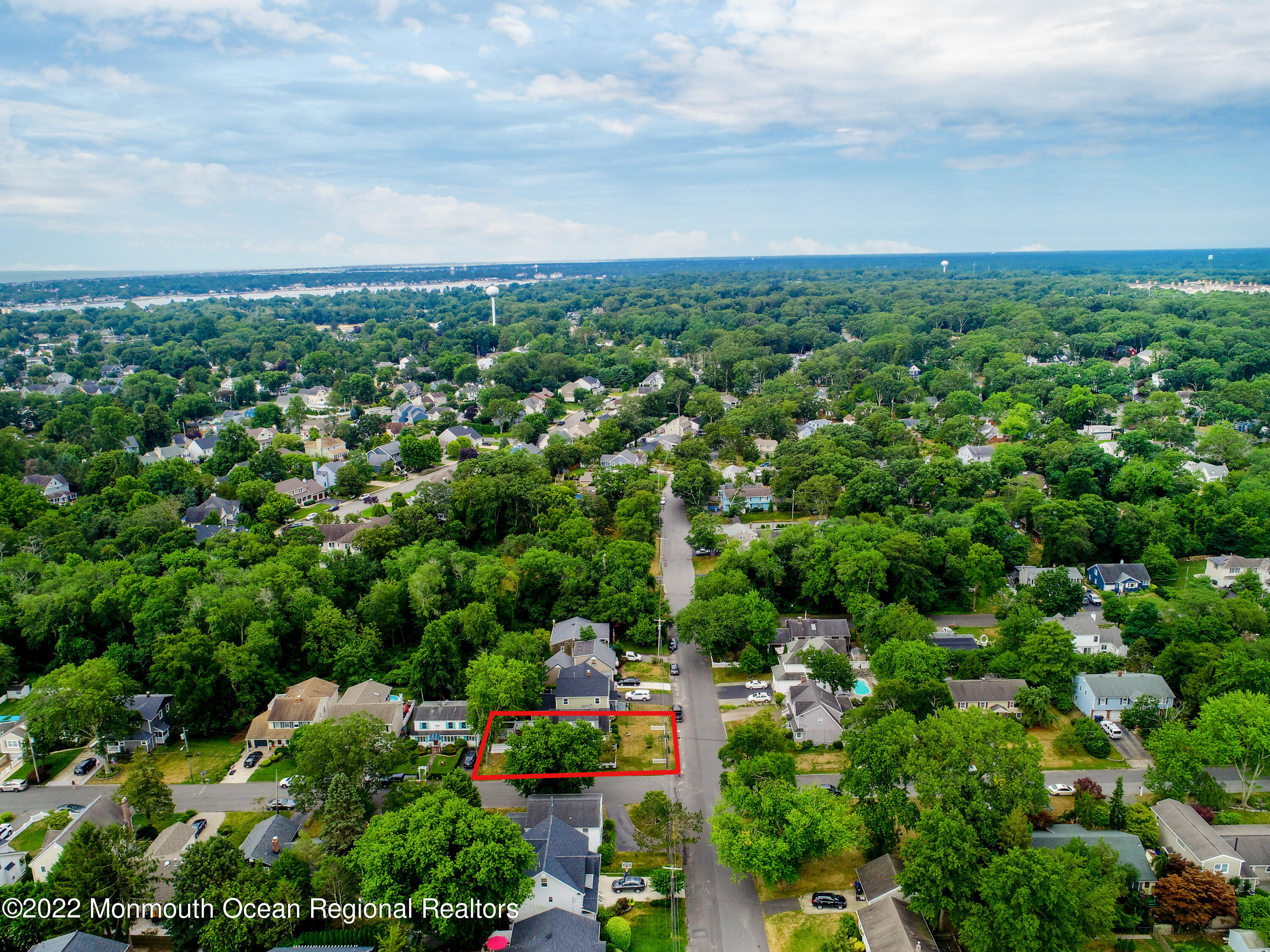 111 Manito Road Manasquan, NJ 08736 - Photo 35 of 37 an aerial view of residential houses with outdoor space and trees