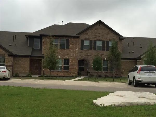 a house view with a garden space