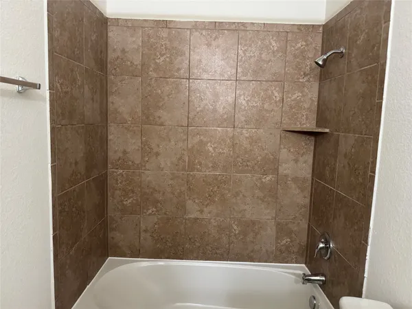 a bathroom with a bathtub