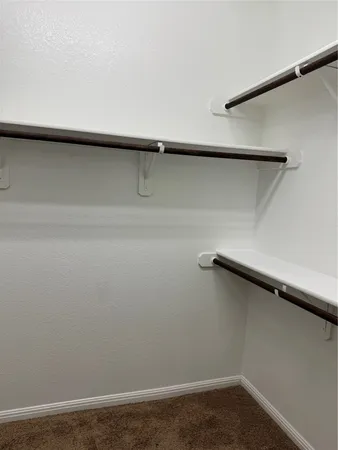 a view of small space with racks on the wall