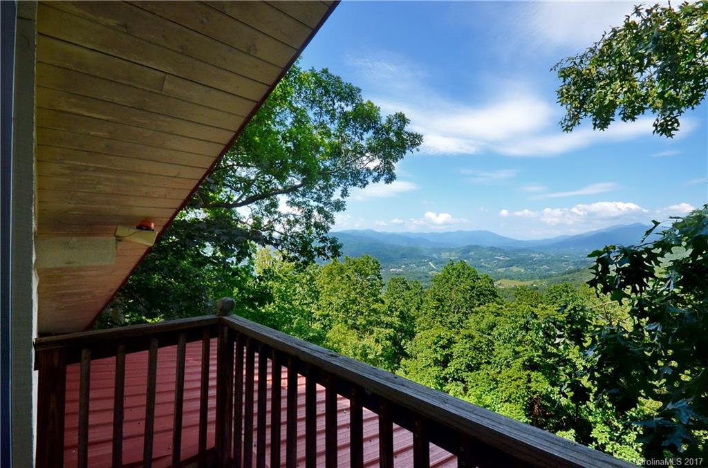 381 Norman Road Clyde, NC 28721 - Photo 12 of 21 a view of a balcony with a pot