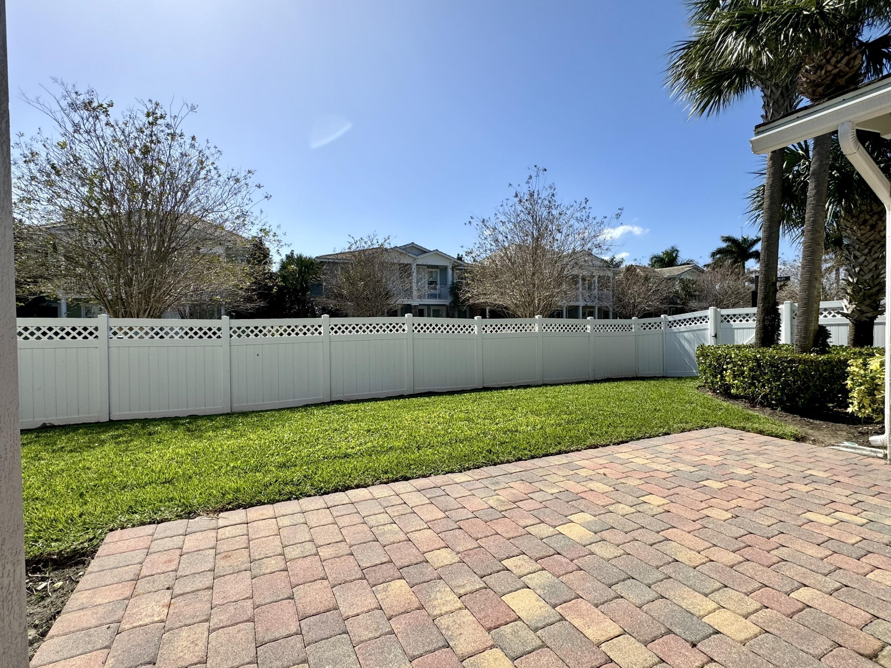 2758 Avalon Way Jupiter, FL 33458 - Photo 8 of 51 a view of a backyard