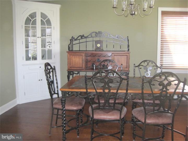 351 Mill Road Havertown, PA 19083 - Photo 9 of 24 a view of a dining room with furniture and chandelier
