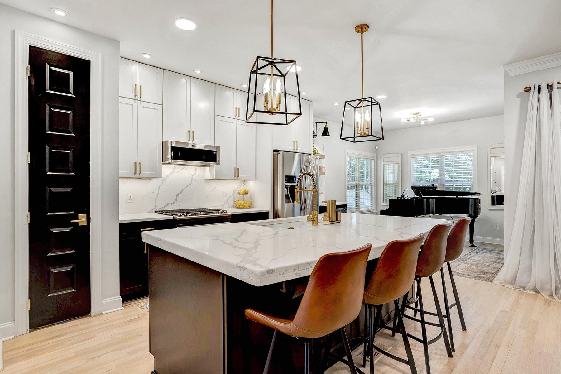a view of kitchen and dining area with furniture