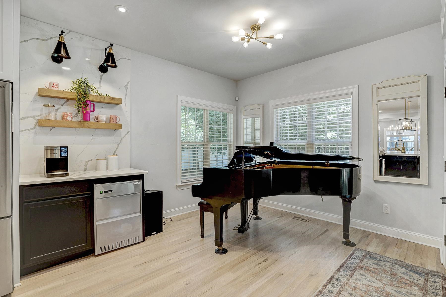 163 Winfred Drive Raleigh, NC 27603 - Photo 15 of 39 a living room with kitchen island furniture and a kitchen view