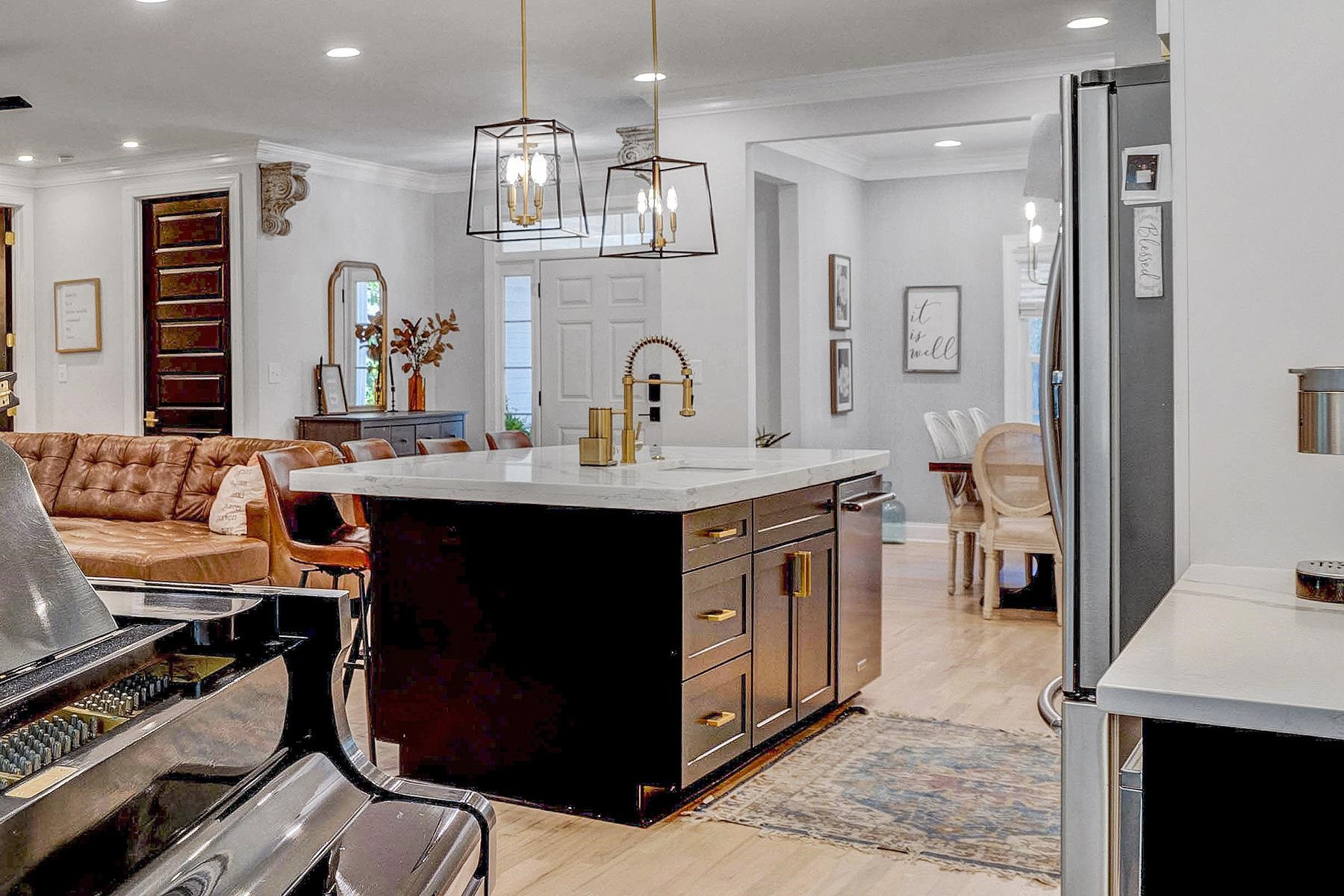 163 Winfred Drive Raleigh, NC 27603 - Photo 16 of 39 a kitchen with a sink appliances and cabinets