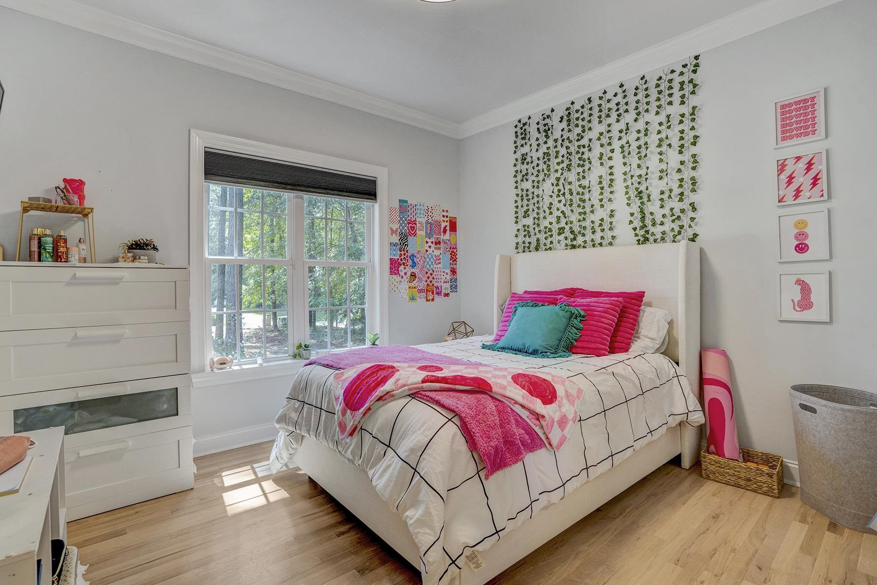 163 Winfred Drive Raleigh, NC 27603 - Photo 24 of 39 a bedroom with a bed and a window