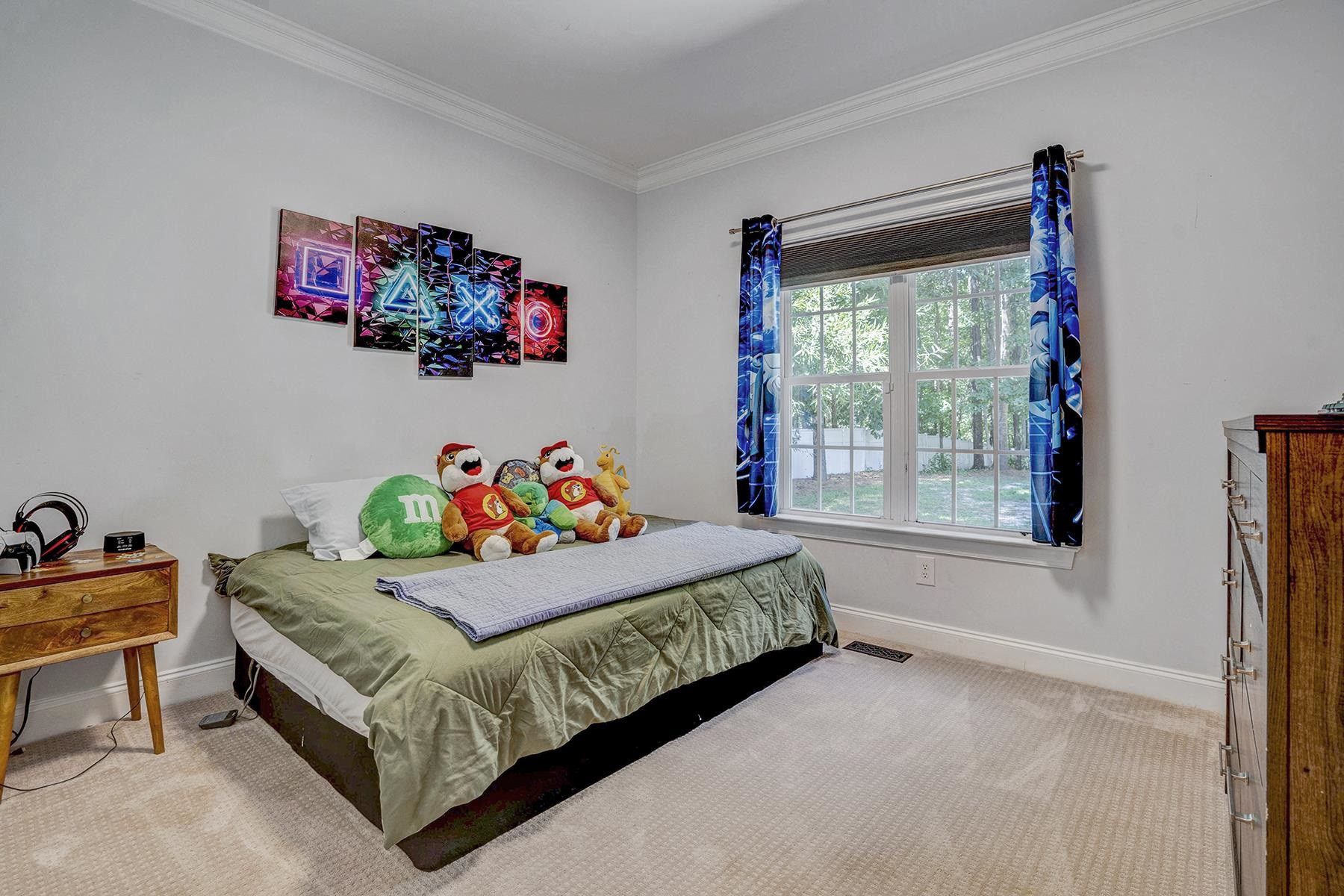 163 Winfred Drive Raleigh, NC 27603 - Photo 26 of 39 a bedroom with a bed and a window