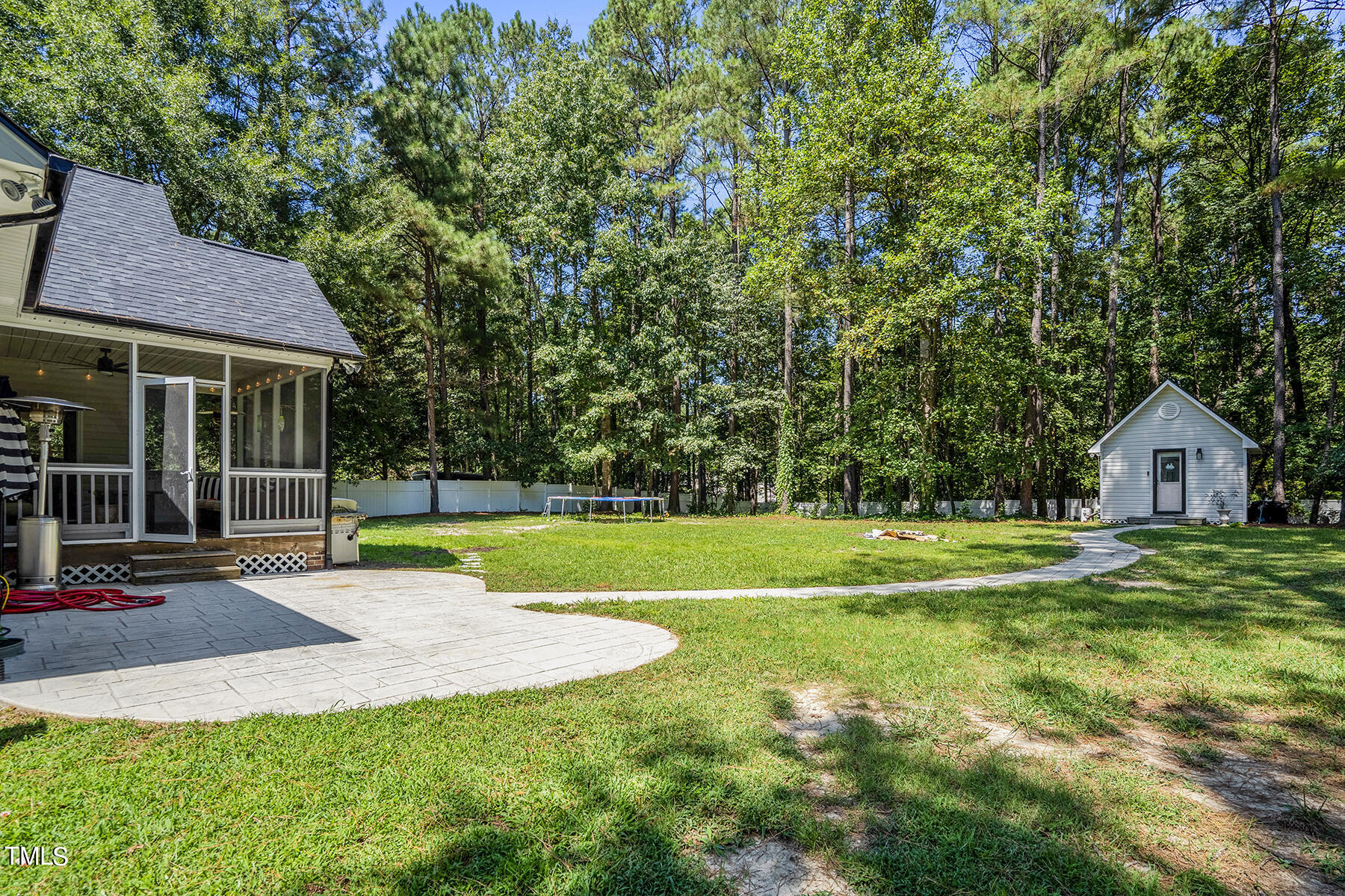 163 Winfred Drive Raleigh, NC 27603 - Photo 37 of 39 a view of a house with a yard and sitting area