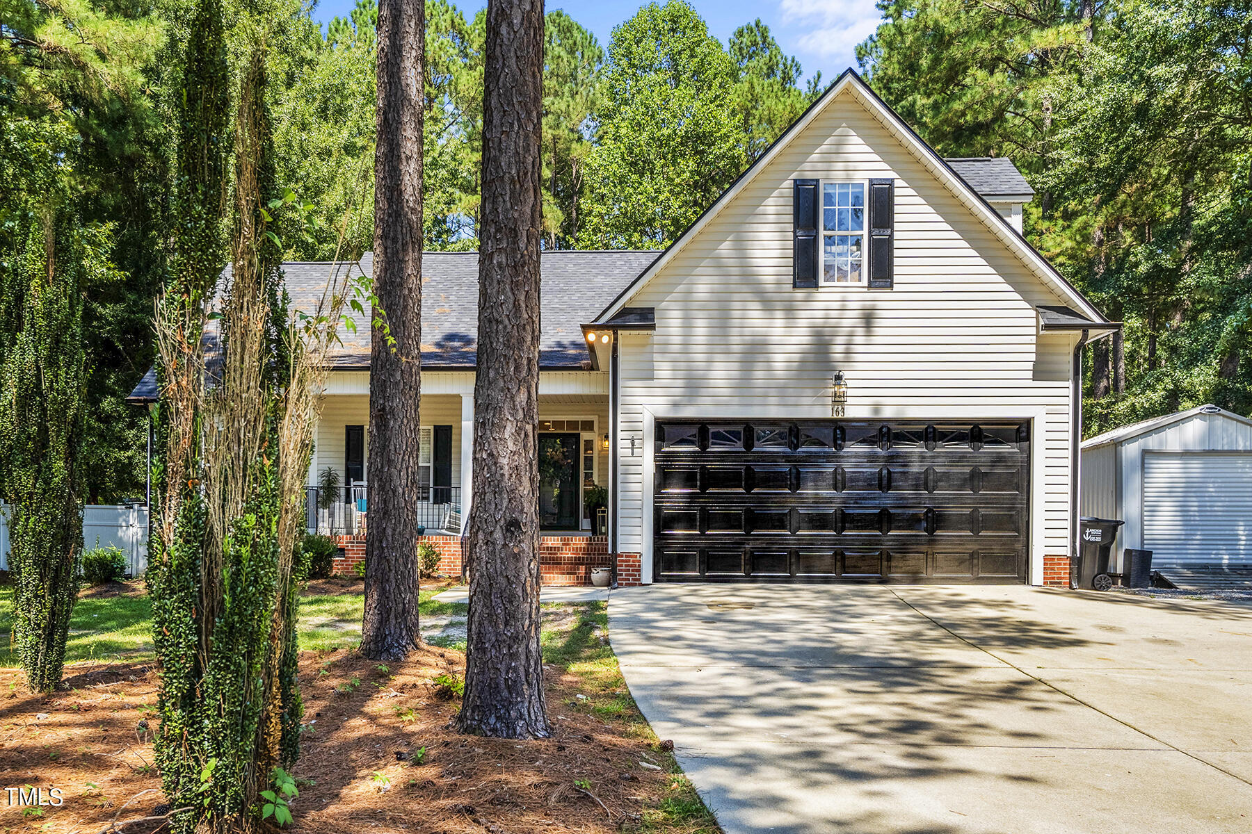 163 Winfred Drive Raleigh, NC 27603 - Photo 4 of 39 a view of a house with a yard