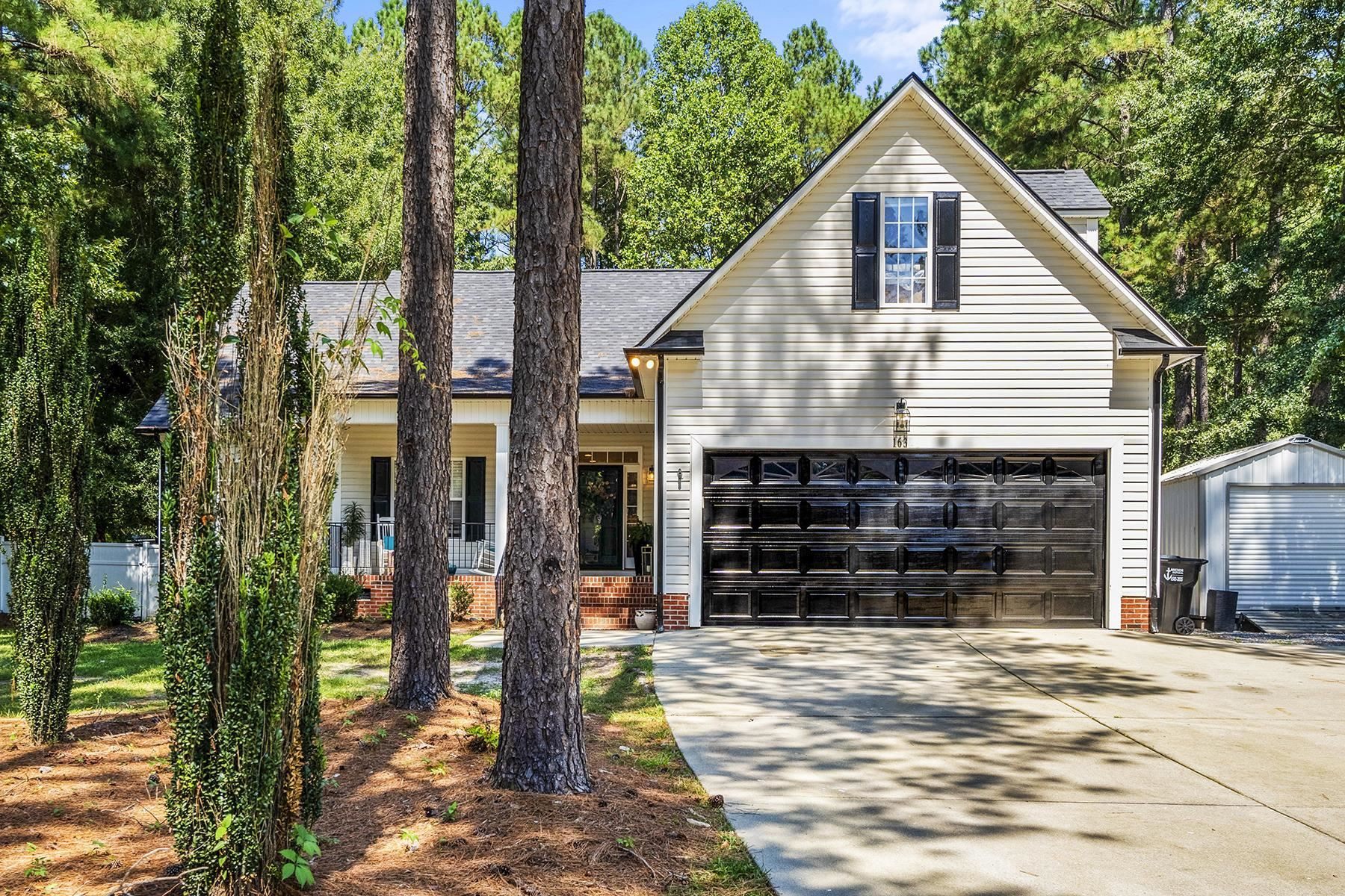 163 Winfred Drive Raleigh, NC 27603 - Photo 6 of 39 a view of a house with a yard