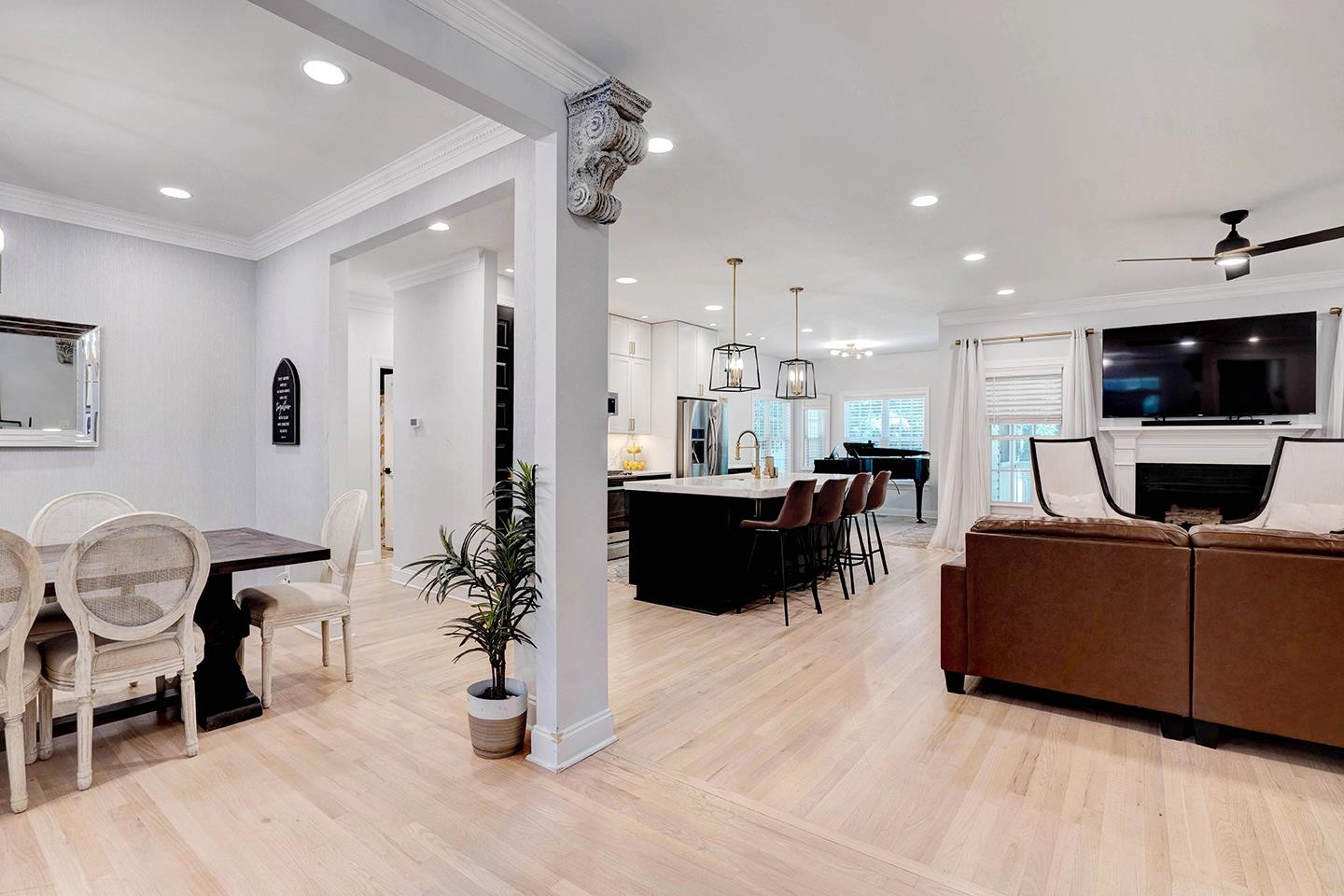 163 Winfred Drive Raleigh, NC 27603 - Photo 8 of 39 a living room with furniture and a flat screen tv