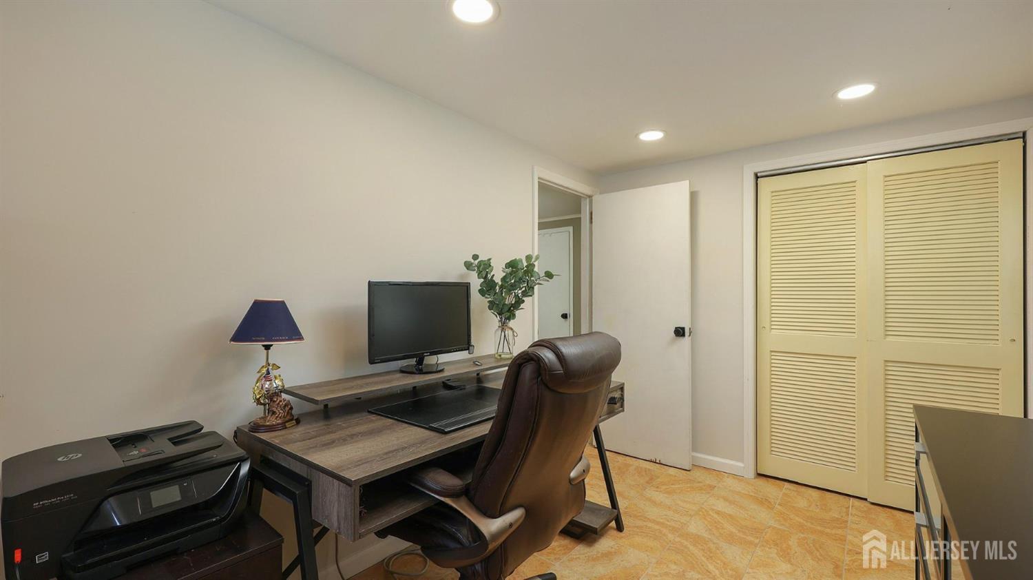 47 Miliken Road Colonia, NJ 07067 - Photo 17 of 40 a view of a workspace with furniture