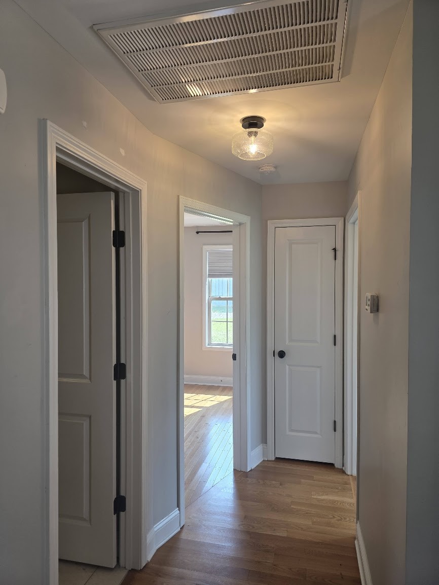 4927 Minnis Road Springfield, TN 37172 - Photo 8 of 15 a view of a hallway with wooden floor