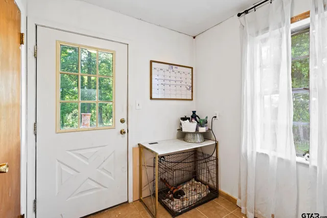 a bathroom with a sink and a window