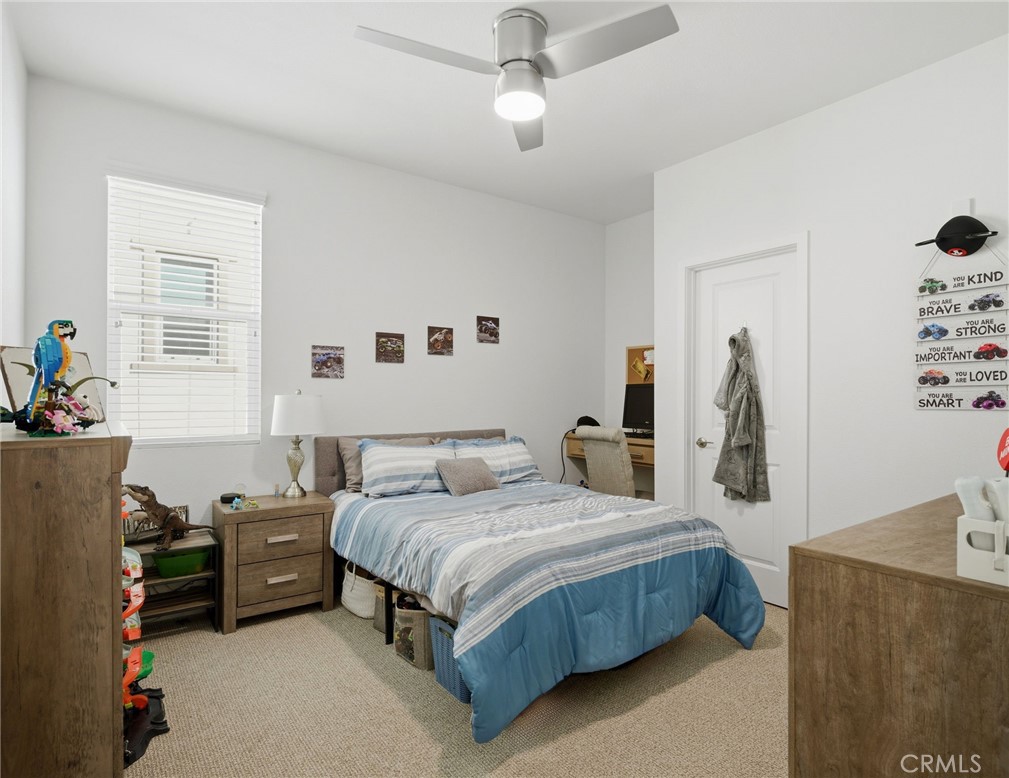 32243 Penstemon Way Temecula, CA 92591 - Photo 16 of 26 a bedroom with a bed and a window