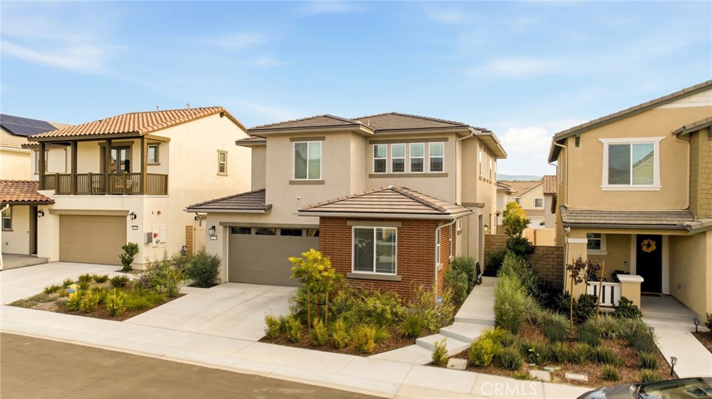 32243 Penstemon Way Temecula, CA 92591 - Photo 2 of 26 a front view of a house